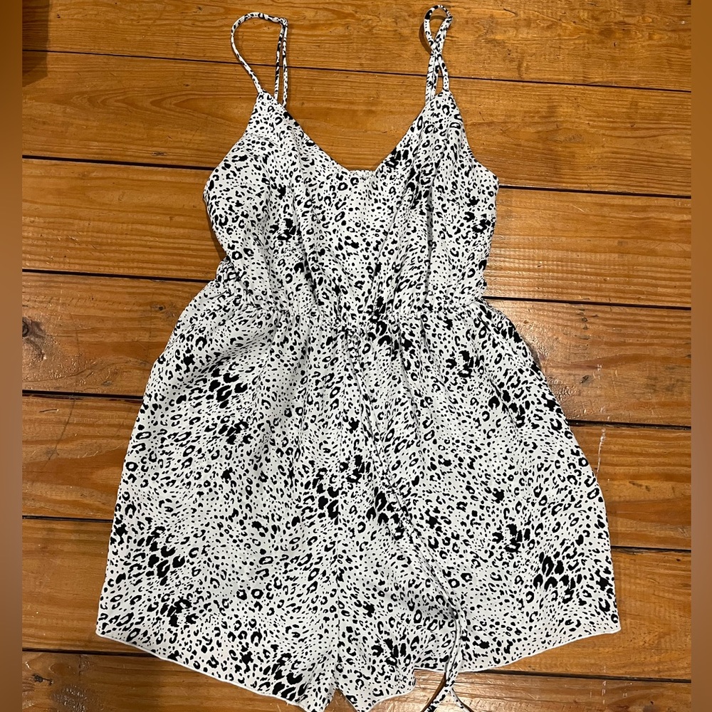 (402) —WHITE AND BLACK ROMPER—